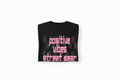 Positive Vibes Street Wear Black Tee — Folded on White